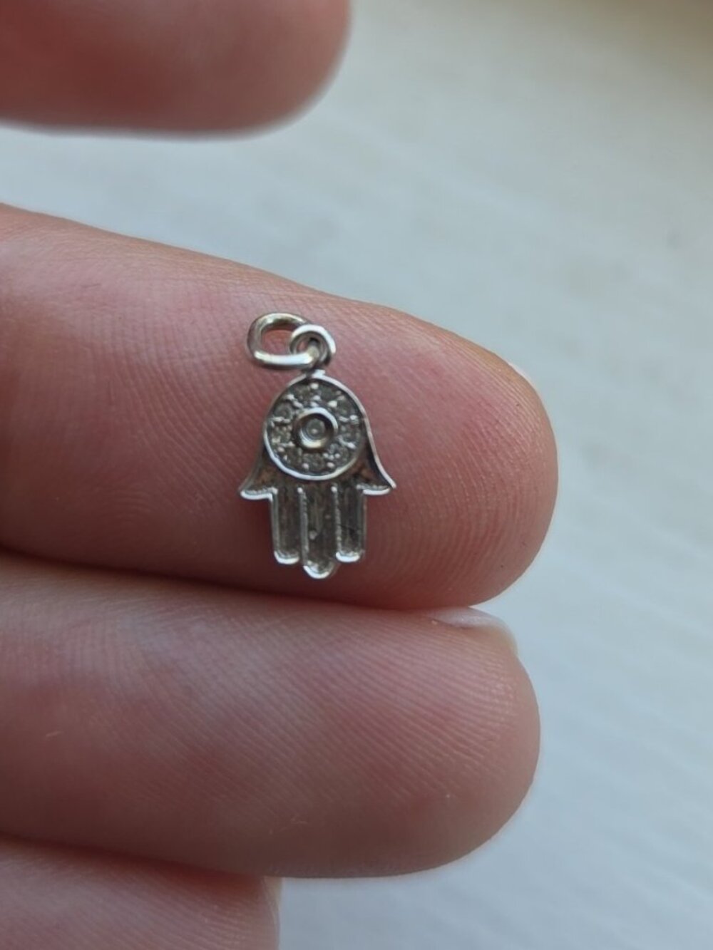 14k white gold hamsa head with diamond accents
